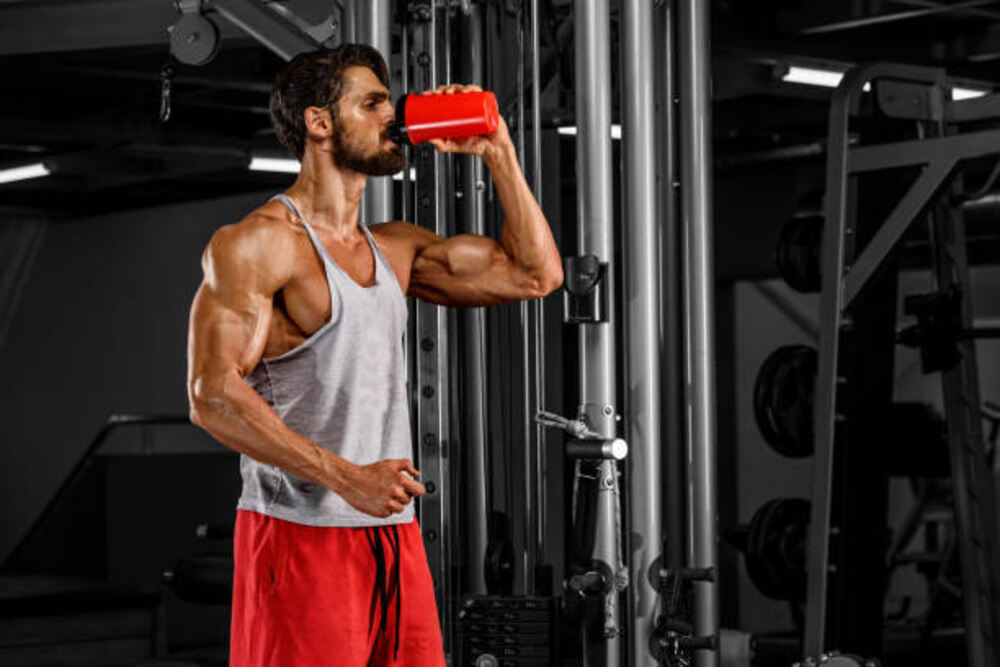athlete taking fitness supplements